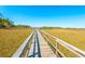 Scenic nature trail boardwalk views of the community marshes at 246 Slipper Shell Ct, Mount Pleasant, SC 29464
