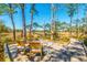 Boardwalk with chairs overlooking scenic wooded marsh views at 246 Slipper Shell Ct, Mount Pleasant, SC 29464