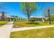 Exterior community buildings showcasing pristine landscaping, sidewalks, and lush green lawns at 246 Slipper Shell Ct, Mount Pleasant, SC 29464
