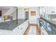 Spacious kitchen with granite countertops, stainless steel appliances, and wooden floors at 246 Slipper Shell Ct, Mount Pleasant, SC 29464