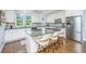 Modern kitchen featuring granite countertops, stainless steel appliances, and island with seating at 246 Slipper Shell Ct, Mount Pleasant, SC 29464