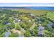 Panoramic aerial view of the neighborhood, highlighting proximity to the golf course, marsh, and ocean at 261 Palm St, Mount Pleasant, SC 29464
