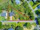 Aerial view of a house surrounded by trees with property lines clearly outlined at 261 Palm St, Mount Pleasant, SC 29464