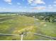 Beautiful aerial view overlooking the marshland, boardwalk, and distant city skyline at 261 Palm St, Mount Pleasant, SC 29464
