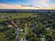 Sweeping aerial view of a neighborhood and the Ravenel Bridge on a picturesque day at 261 Palm St, Mount Pleasant, SC 29464