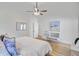 Bright bedroom with high ceilings and ample natural light from large windows at 261 Palm St, Mount Pleasant, SC 29464