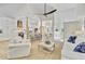 Bright open concept living room and kitchen with high ceilings and modern finishes at 261 Palm St, Mount Pleasant, SC 29464