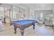 The living room features a game room with an elegant pool table at 261 Palm St, Mount Pleasant, SC 29464