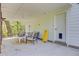 Patio area featuring comfortable seating and easy access to the yard and outdoor amenities at 261 Palm St, Mount Pleasant, SC 29464