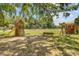 Community playground area with play structure and a swing set at 261 Palm St, Mount Pleasant, SC 29464