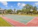 Full tennis court and play area with basketball hoop for recreational activities and outdoor enjoyment at 261 Palm St, Mount Pleasant, SC 29464
