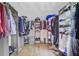 Spacious walk-in closet with custom shelving and ample storage for clothes and accessories at 261 Palm St, Mount Pleasant, SC 29464