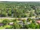An aerial view of a neighborhood with tree lined streets at 267 Industrial Rd, Walterboro, SC 29488