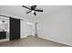Bedroom with fan, barn door to bathroom and closet at 267 Industrial Rd, Walterboro, SC 29488