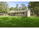 Charming single-story brick home featuring a well-maintained lawn at 267 Industrial Rd, Walterboro, SC 29488