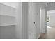 Bright hallway with closet and open doors to other rooms at 267 Industrial Rd, Walterboro, SC 29488