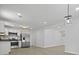 Well-lit, modern kitchen with white cabinets, stainless steel appliances, and an open layout at 267 Industrial Rd, Walterboro, SC 29488