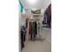 Walk-in closet with metal racks and shelves for ample clothing and storage space at 2941 Murraywood Rd, Johns Island, SC 29455