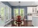 Eat-in kitchen area featuring modern lighting, with hardwood floors and blue walls at 2941 Murraywood Rd, Johns Island, SC 29455