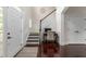 Bright foyer with hardwood floors and a staircase at 2941 Murraywood Rd, Johns Island, SC 29455