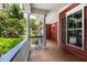 A covered front porch features white columns and railings at 2941 Murraywood Rd, Johns Island, SC 29455