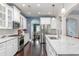 Gourmet kitchen with stainless steel appliances, white cabinets and marble countertops at 2941 Murraywood Rd, Johns Island, SC 29455