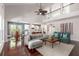 Spacious living room with fireplace, vaulted ceilings, and large windows at 2941 Murraywood Rd, Johns Island, SC 29455