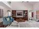 Open living room featuring vaulted ceilings, hardwood floors, and custom built-ins at 2941 Murraywood Rd, Johns Island, SC 29455