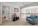 Upstairs loft area with seating, natural light, and beautiful views at 2941 Murraywood Rd, Johns Island, SC 29455