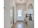 Hallway with wood flooring, decorative lighting, and convenient access to rooms at 306 Lucca Dr, Summerville, SC 29486