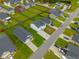 Aerial view of a house situated in a residential area, featuring well-kept yards and convenient street access at 330 Bountiful Dr, Moncks Corner, SC 29461