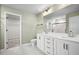 Bathroom featuring double sink vanity with tub and shower as well as adjacent closet at 330 Bountiful Dr, Moncks Corner, SC 29461