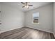 Bedroom with hardwood floors, a ceiling fan, and a bright window at 330 Bountiful Dr, Moncks Corner, SC 29461