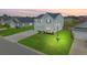 Charming two-story home featuring a manicured lawn and a well-lit street in a Gathering-friendly neighborhood at 330 Bountiful Dr, Moncks Corner, SC 29461