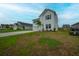 Beautifully maintained home with a green lawn, a paved driveway, and an attached two-car garage at 330 Bountiful Dr, Moncks Corner, SC 29461