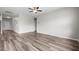 Spacious living room with hardwood floors, ceiling fan, and neutral color palette at 330 Bountiful Dr, Moncks Corner, SC 29461
