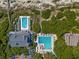 Stunning aerial shot of a community featuring swimming pools and manicured greenery at 3577 Shipwatch Rd, Kiawah Island, SC 29455