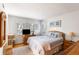 Bright bedroom with a comfortable bed, ample natural light from the window, and cozy decor at 3577 Shipwatch Rd, Kiawah Island, SC 29455