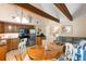Open-concept living space with a well-equipped kitchen, dining area, and comfortable seating arrangements at 3577 Shipwatch Rd, Kiawah Island, SC 29455