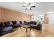 Spacious living room boasting stylish seating, modern floors, and seamless flow to dining area at 4551 Great Oak Dr, North Charleston, SC 29418