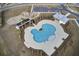 An aerial image showcasing a community pool, parking and surrounding residences at 490 Pender Woods Dr, Summerville, SC 29486