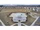 An aerial view of a community pool, cabana, parking and neighborhood homes at 490 Pender Woods Dr, Summerville, SC 29486