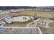 Overhead shot showing a community pool, clubhouse, playground and nearby homes at 490 Pender Woods Dr, Summerville, SC 29486