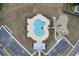 Aerial view of neighborhood pool area with playground, cabana, and ample parking at 490 Pender Woods Dr, Summerville, SC 29486
