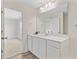 Bright bathroom featuring a vanity with quartz counters, and wood-look flooring at 490 Pender Woods Dr, Summerville, SC 29486