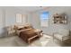 Comfortable bedroom with a bed, stylish accents, and a bright window at 490 Pender Woods Dr, Summerville, SC 29486