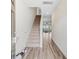 Bright entryway with hardwood floors, staircase, and open view of the living area at 490 Pender Woods Dr, Summerville, SC 29486