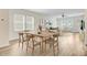 Bright living room with large windows, comfortable seating, and stylish decor at 490 Pender Woods Dr, Summerville, SC 29486