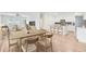Open concept living area with modern kitchen, dining table, and comfortable seating arrangement at 490 Pender Woods Dr, Summerville, SC 29486