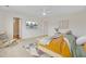 Spacious main bedroom with a TV, comfortable seating area, and neutral decor at 490 Pender Woods Dr, Summerville, SC 29486